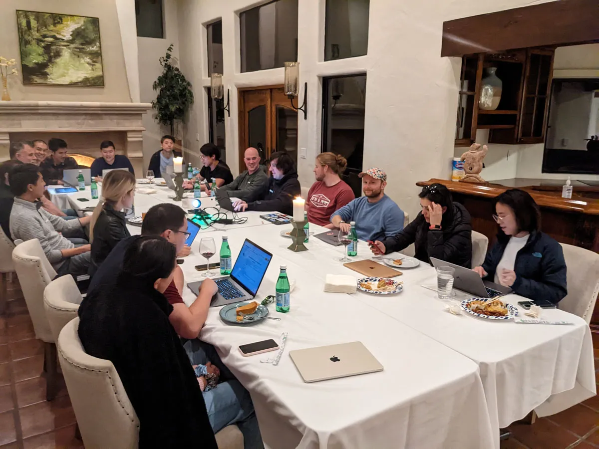 Inception Studio cohort 1 photo of cohort members sitting around a dinner table