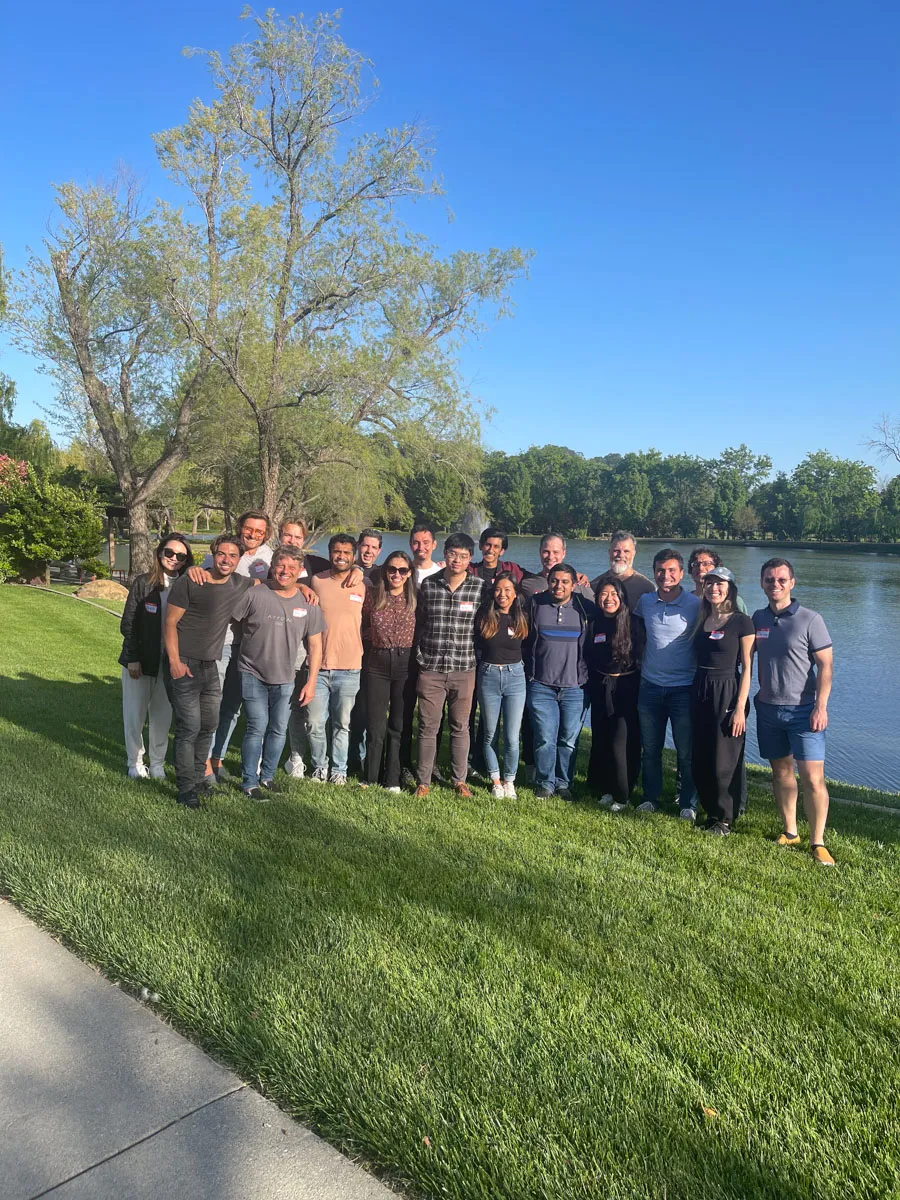 Inception Studio cohort 3 photo of cohort members standing in front of a lake